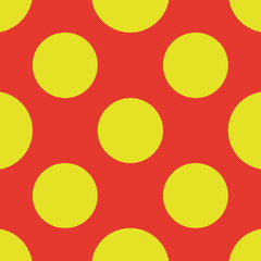 Pattern with regular polka dot. Seamless background. Bright orange and yellow. For printing on fabric, paper, wrapper.