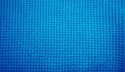 Blue knitted fabric background texture