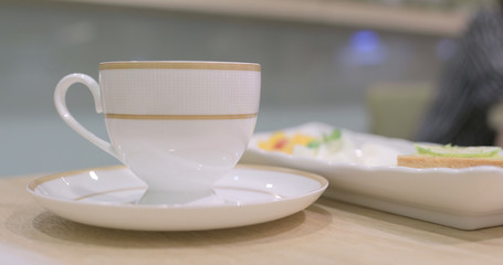 Woman enjoy tea time in coffee shop