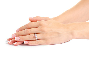 Female hand with a silver ring on a white background isolation