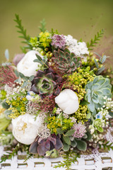 Obraz na płótnie Canvas wedding bouquet made from green succulent plants 