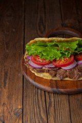 background,barbecue,beef,bread,cabbage,chicken,closeup,dinner,donner,döner,fast,food,greek,green,grilled,gyro,hamburger,health,healthy food,kebab,kebap,lettuce,lunch,meal,meat,onion,orange,pita,roast,