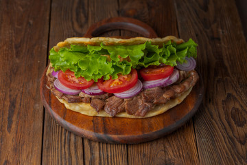 background,barbecue,beef,bread,cabbage,chicken,closeup,dinner,donner,döner,fast,food,greek,green,grilled,gyro,hamburger,health,healthy food,kebab,kebap,lettuce,lunch,meal,meat,onion,orange,pita,roast,