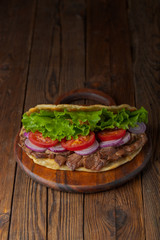 background,barbecue,beef,bread,cabbage,chicken,closeup,dinner,donner,döner,fast,food,greek,green,grilled,gyro,hamburger,health,healthy food,kebab,kebap,lettuce,lunch,meal,meat,onion,orange,pita,roast,