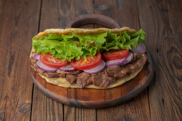 background,barbecue,beef,bread,cabbage,chicken,closeup,dinner,donner,döner,fast,food,greek,green,grilled,gyro,hamburger,health,healthy food,kebab,kebap,lettuce,lunch,meal,meat,onion,orange,pita,roast,