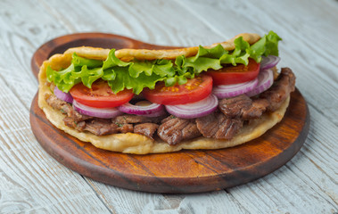background,barbecue,beef,board,bottle,bread,cabbage,chicken,closeup,dinner,dish,donner,döner,fast,food,greek,green,grilled,gyro,hamburger,health,healthy food,kebab,kebap,lettuce,lunch,meal,meat,onion,