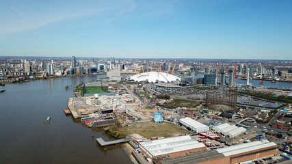 Fototapeta na wymiar Aerial drone bird's eye view from iconic O2 Arena near isle of Dogs as seen from Greenwich, London, United Kingdom