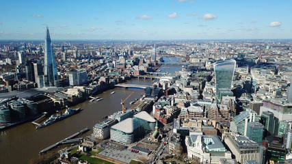 Fototapeta na wymiar Aerial drone bird's eye view of iconic skyline in City of London as seen from St Katharine Docks Marina, London, United Kingdom