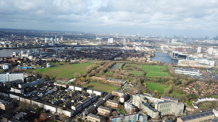 Obraz premium Aerial bird's eye view photo taken by drone of Greenwich village residential area by river Thames, London, United Kingdom