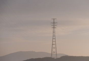 Hight-voltage electric power lines at sunset.
