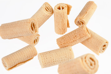 Wafer rolls. Gtoup of tasty crispy tube wafer on white background. Dessert