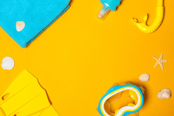 Summer composition of beach accessories and seashells top view