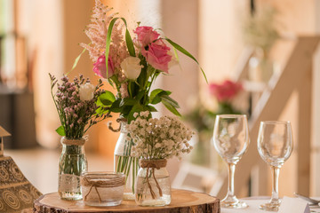 detail of boquets on a wedding  table centre piece