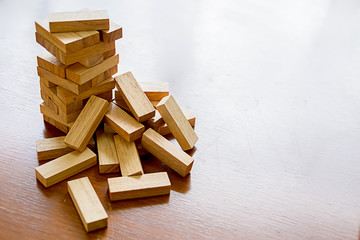 Problem Solving Business can't stop effect of dominoes continuous toppled with business team feeling sad and stress in office background. Failure Business Concept.