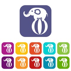 Elephant balancing on a ball icons set vector illustration in flat style in colors red, blue, green, and other