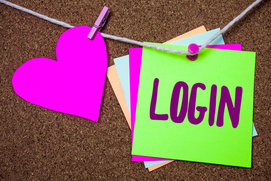 Word writing text Login. Business concept for Act of entering into a computer database or system Starting session Heart thread sticky small cliped string thumb pin dark rough background.