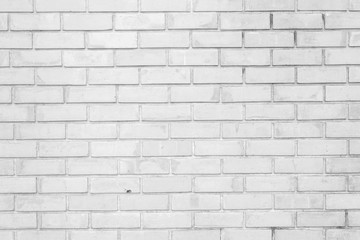 Naklejka premium White stone brick wall seamless background and pattern.