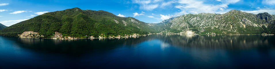 Obraz na płótnie Canvas Aerial panoramic view of the Kotor bay and villages along the coast