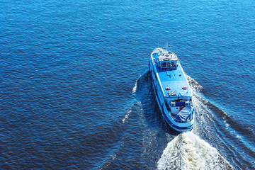 Great cruise boat in the blue sea - top view