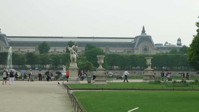 June 5, 2018 Paris, France. Garden Tuileries on a summer rainy day, time lapse