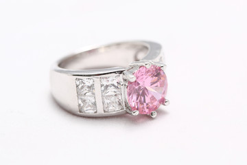 pink gem stone on diamond ring