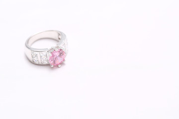 pink gem stone on diamond ring