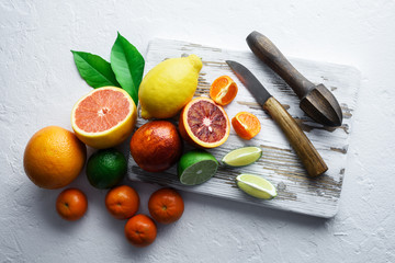 Mix of different citrus fruits closeup. Healthy diet vitamin concept. Food photography