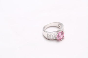 pink gem stone on diamond ring