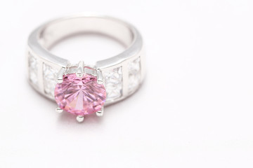 pink gem stone on diamond ring
