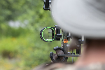 Close up of a compound bow target sights.