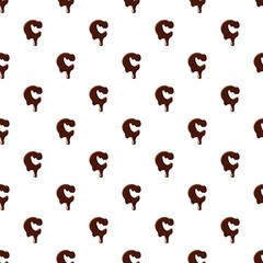 Letter C from latin alphabet with numbers and symbols made of dark melted chocolate