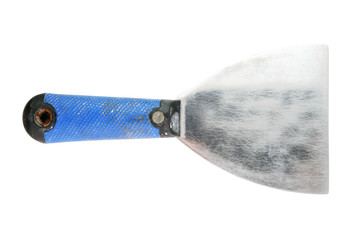 Old putty knife on white background, top view