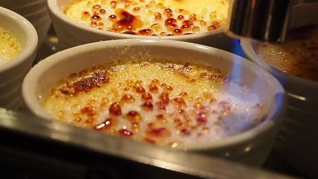 Burning suger on top of dessert.