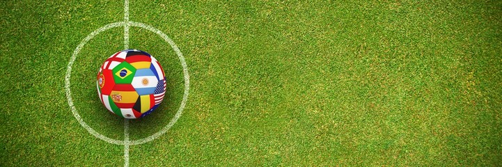 Composite image of football in multi national colours