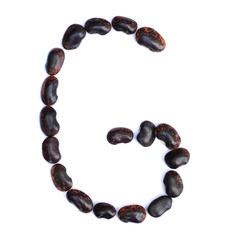 The letter G is made of beans. Symbol of the English alphabet of beans on a white background.