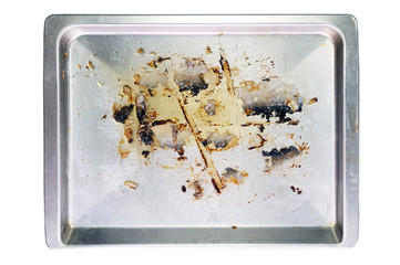 Old oven baking tray isolated on white