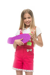 Modern hobby. Penny boards also known as mini cruiser. Girl smiling face holds penny board isolated white background. Originally designed as girls skateboard. Kid girl ready ride penny board
