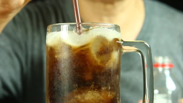 Man drinking  cola drink