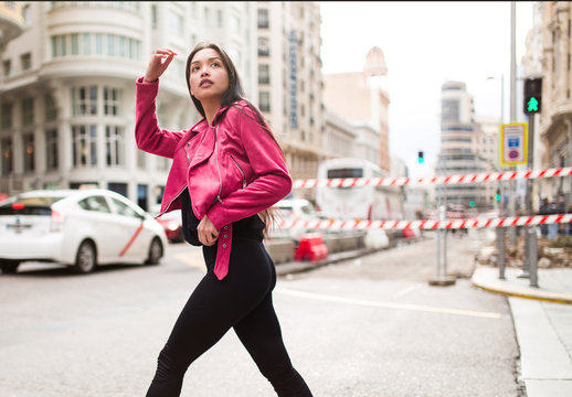 Trendy Young Woman Walking On Street