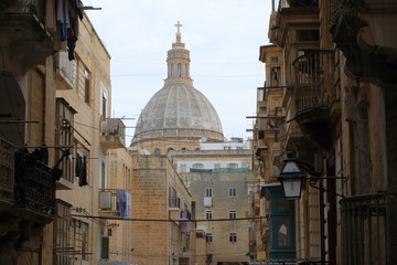 Malta - Valetta view to Carmelite church. typical street