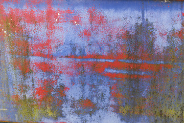 Rusty colorful painted metal texture close up