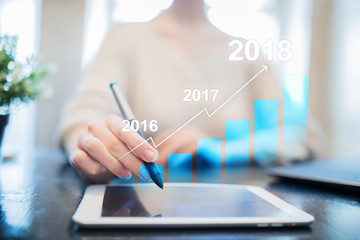 2018 year profit growth chart, Business, finance and investment concept on virtual screen. Goals setting on improvement.