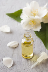 Obraz na płótnie Canvas Oil of jasmine. Aromatherapy with jasmine oil. Jasmine flowers