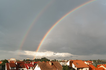 Rainbow above the small city