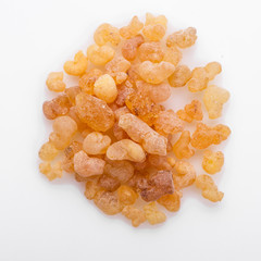 fragrant frankincense on a white acrylic background