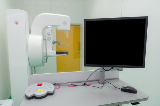 computer system with black screen in operating room with Mammography X-Ray System Machine in hospital, laboratory, cancer and disease treatment, medical diagnosis and health care technology concept