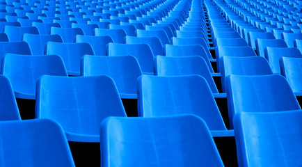 A stadium with blue seats across the geometry