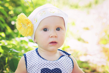 Cute little girl outdoors in countryside - happy healthy child