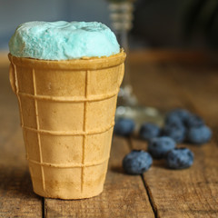 ice cream with blueberries and waffles Close up - ice cream cone. food background
