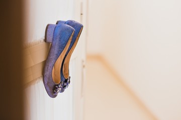 Wedding shoes on their wedding isolated in a room